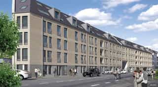 Man sieht die große Aussenfassade des Standortes Rodenkirchen von PhysioSport Köln.